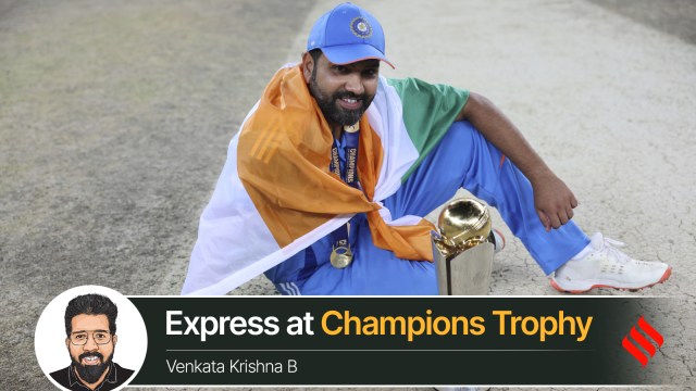 India's captain Rohit Sharma poses with the winners trophy after defeating New Zealand in the final cricket match of the ICC Champions Trophy at Dubai International Cricket Stadium in Dubai, United Arab Emirates. (AP)