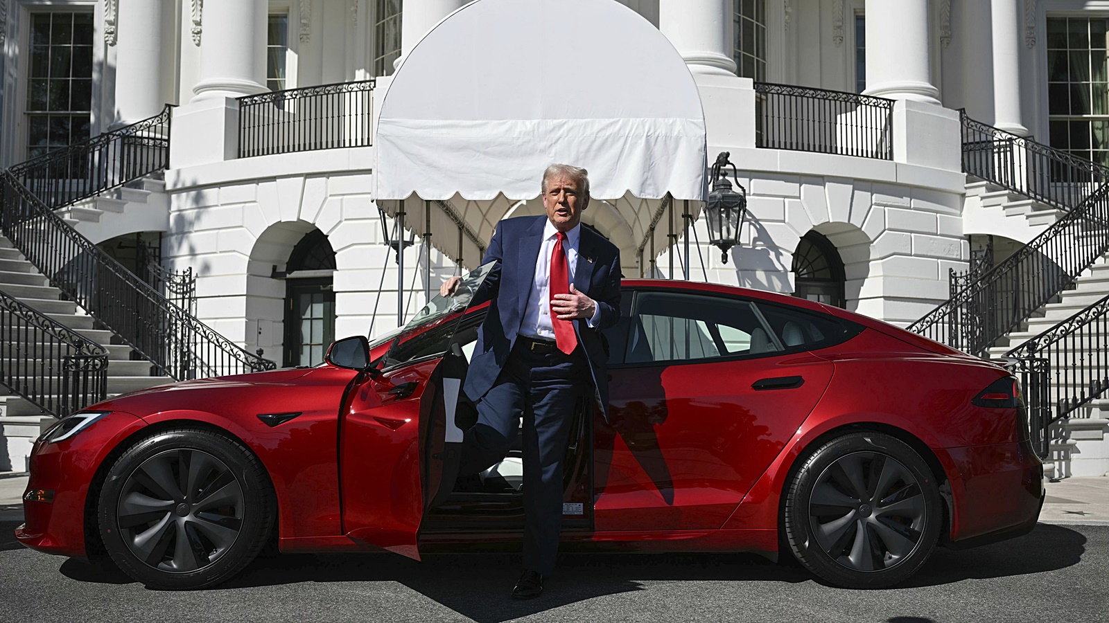 Trump buys Tesla to show support for Elon Musk as EV giant faces ...