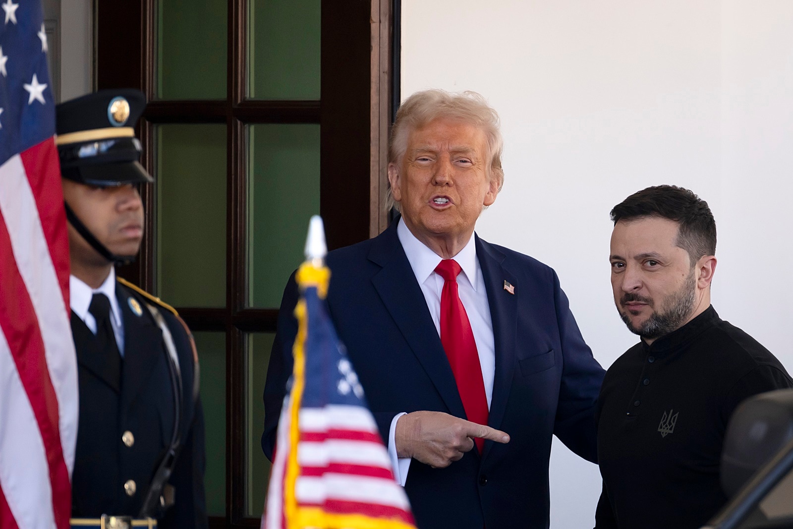 Ukraine President Volodymyr Zelenskyy is greeted by President Donald Trump as he arrives at the White House in Washington on Friday