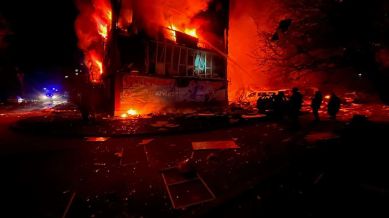 In this photo provided by the Ukrainian Emergency Service, firefighters put out the fire following a Russian rocket attack in Dobropillya, Donetsk region, Ukraine, Saturday, March 8, 2025. (Ukrainian Emergency Service via AP)