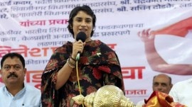 File image of wrestler-turned-politician Vinesh Phogat addressing the crowd at a rally. (Express photo by Pavan Khengre)