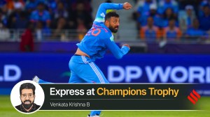 India's Varun Chakravarthy bowls a delivery during the ICC Champions Trophy cricket match between India and New Zealand at Dubai International Cricket Stadium. (AP Photo)
