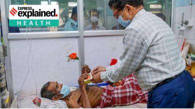 A doctor offers flowers to a TB (Tuberculosis) patient on World TB Day, at Govind Ballabh Pant Hospital, in Agartala, Monday, March 24, 2025. (PTI Photo)