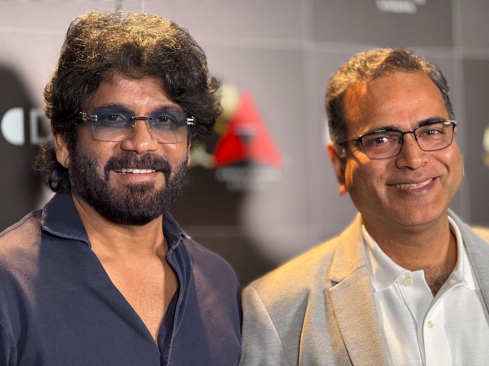 Ashim Mathur, Vice-President Marketing for APAC at Dolby Laboratories with Nagarjuna (right to left). (Express Photo)