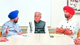 AICC General Secretary and in-charge of Punjab Bhupesh Baghel with state Congress chief Amrinder Singh Raja Warring and Leader of Opposition in the State Assembly Partap Singh Bajwa during a meeting of state Congress Legislative Party, at AICC headquarters, New Delhi, Tuesday. PTI
