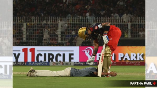 The accused, Rhituparno Pakhira, ran onto the field and embraced Virat Kohli before falling at his feet.