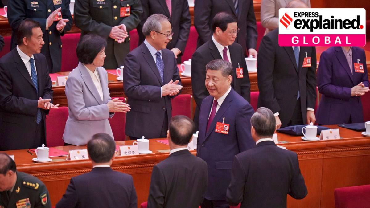 Chinese President Xi Jinping, center, leaves after the closing session of the National People's Congress (NPC) at the Great Hall of the People in Beijing in Beijing, China, Tuesday, March 11, 2025.