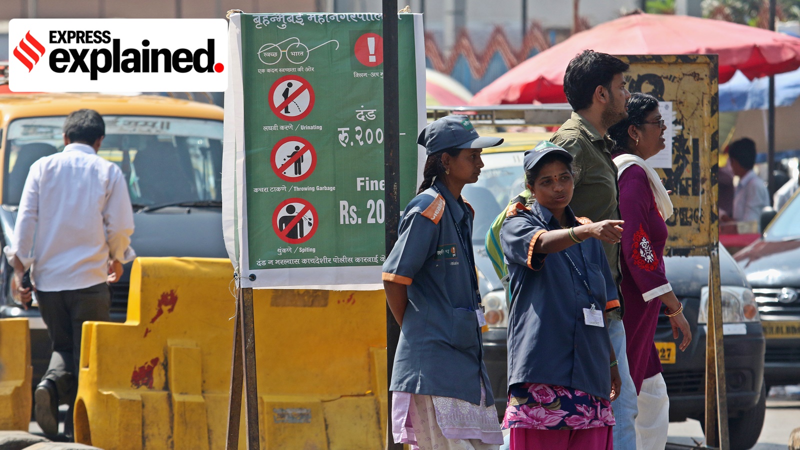 BMC clean-up marshals outside Dadar station in Mumbai.