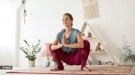 malasana drinking warm water