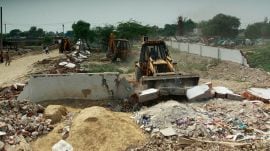 The issue of illegal dumping of waste at Rangpuri Pahari has severe consequences, including aircraft accidents, health hazards, and national security threats. (Express Archives)
