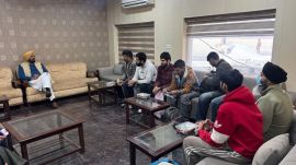 NRI affairs minister Kuldeep Singh Dhaliwal, during meeting with deportees at Amritsar on February 5 after the flight landed from the US.