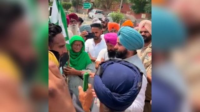 AAP's Sukhveer Singh Maiserkhana being questioned by BKU Sidhupur leaders at Balloh village of Bathinda on Friday.