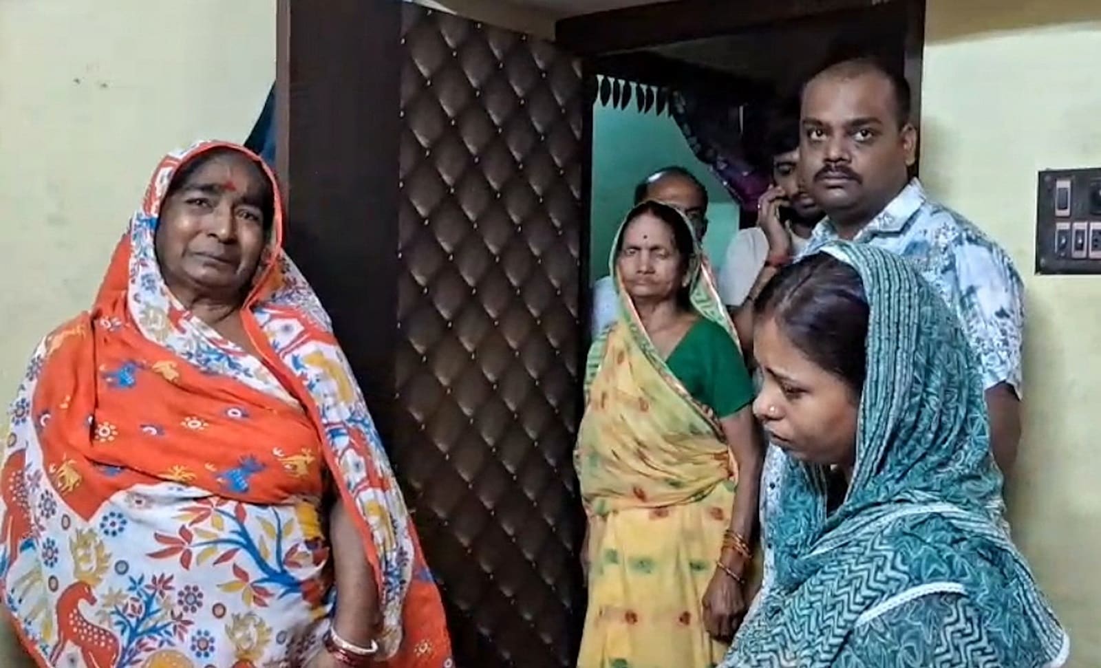 Family members of constable Purnam Kumar Shaw at their house in Rishra, Hoogly district.