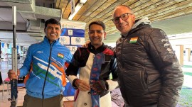 Chain Singh with coaches Satgurdass (L) and Thomas Farnik after winning bronze at the ISSF World Cup in Buenos Aires on Friday. (NRAI)