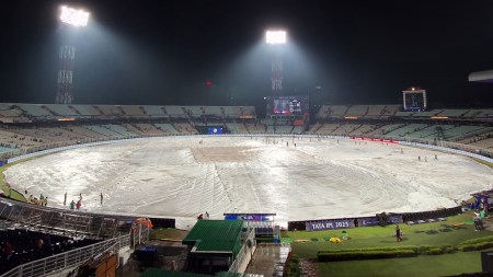 The Eden Gardens ground covered with sheets as rain in Kolkata abandoned the IPL 2025 game between Kolkata Knight Riders and Punjab Kings. (EXPRESS PHOTO by Partha Paul)