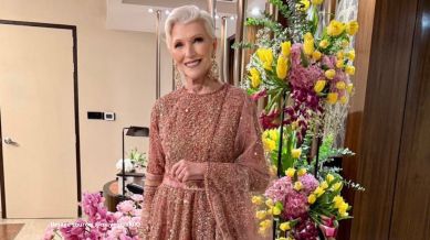 In the photo, Maye Musk stood next to the giant bouquet filled with lilies, roses, and tulips (Image source: @mayemusk/X)