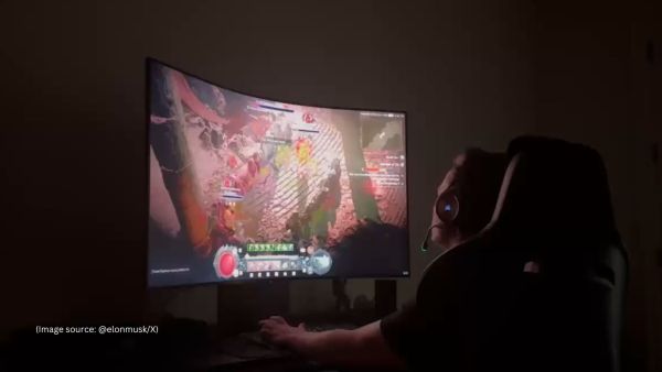 Elon Musk is seen playing games on a Samsung Odyssey Ark monitor