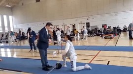 American fencer Stephanie Turner takes the knee in protest of her opponent at an event in USA. (Screengrab via Fox News)