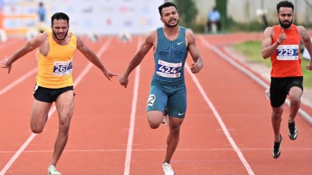 Pranav Pramod Gurav (C) won the men's 100 metres gold medal at the Federation Cup Senior Athletics Championships in Kochi. (Special arrangement)