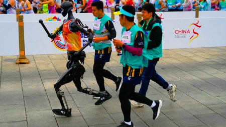 A robot takes part in what is billed as the world's first robot half marathon during the Humanoid Robot Half-Marathon held in Beijing on Saturday, April 19, 2025. (AP Photo)