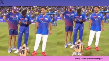 In a playful twist, the star cricketer accidentally pressed a button that caused the robot to lunge toward Akashi Ambani