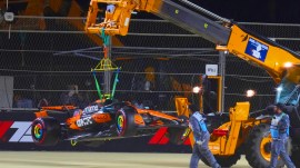 McLaren driver Lando Norris' car is carried out of the track after crashing during the qualifying session ahead of the Formula One Saudi Arabian Grand Prix at the Jeddah Corniche Circuit in Jeddah, Saudi Arabia, Saturday, April 19, 2025. (AP Photo)