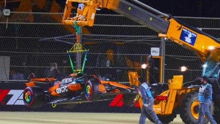 McLaren driver Lando Norris' car is carried out of the track after crashing during the qualifying session ahead of the Formula One Saudi Arabian Grand Prix at the Jeddah Corniche Circuit in Jeddah, Saudi Arabia, Saturday, April 19, 2025. (AP Photo)