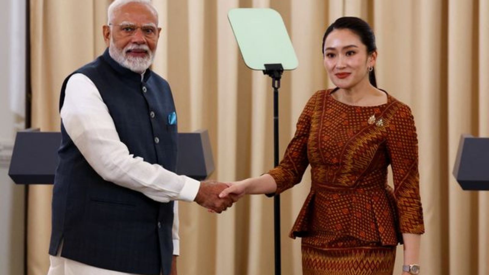 India's Prime Minister Narendra Modi and Thailand's Prime Minister Paetongtarn Shinawatra shake hands at the Government House, in Bangkok, Thailand, April 3, 2025. REUTERS/Athit Perawongmetha