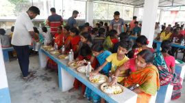 People hit by communal violence having lunch at a dormitory in Murshidabad. (Express Photo/Partha Paul)