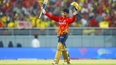 Priyansh Arya of Punjab Kings raises his bat after scoring a hundred against Chennai Super Kings at Mullanpur. (PHOTO: Sportzpics for IPL)