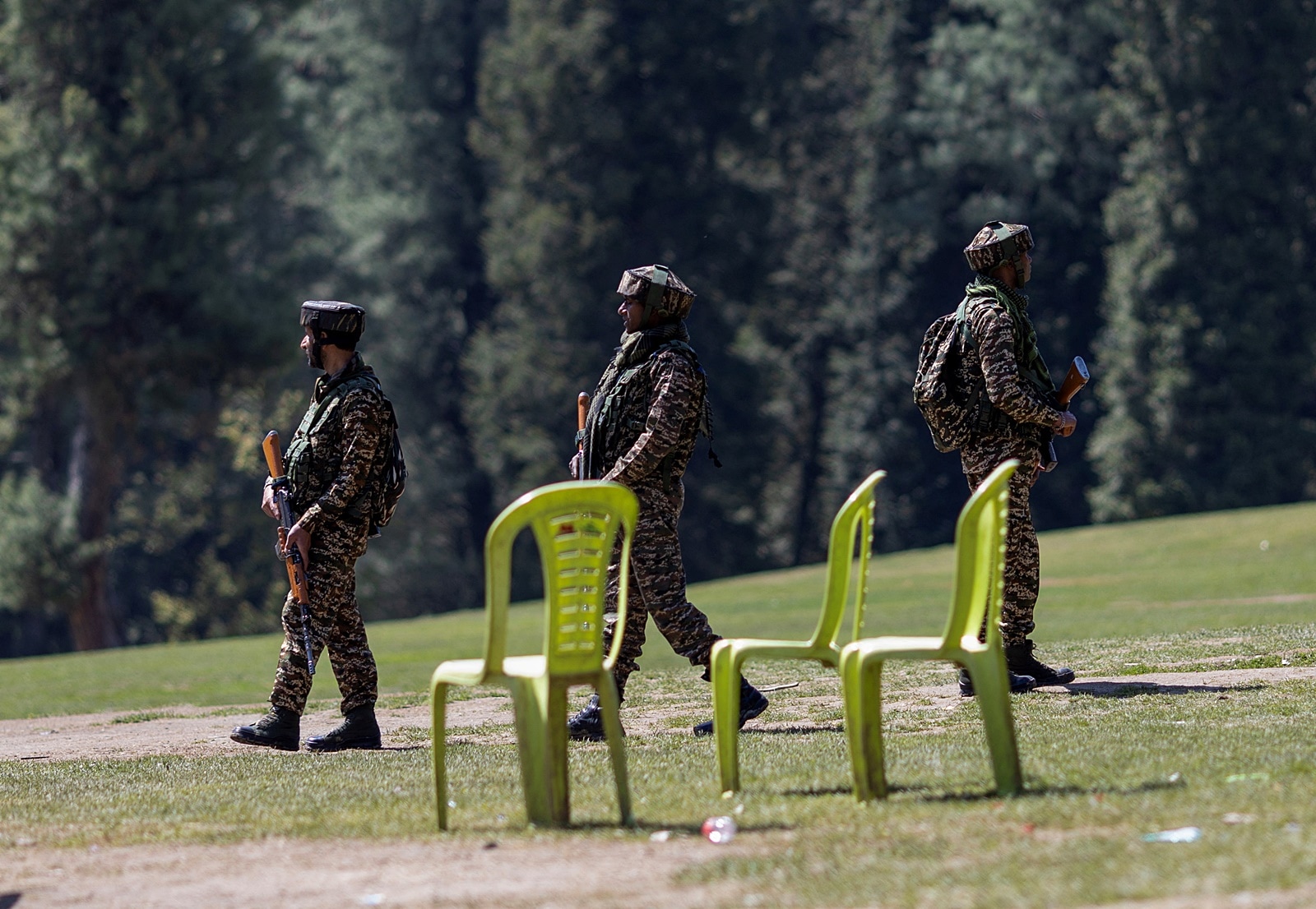 Security force personnel patrol at the site of the militant attack in Pahalgam
