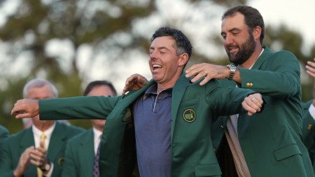 Scottie Scheffler puts the green Jacket on career Grand Slam winner, Rory McIlroy. (AP)