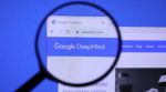 Homepage of Google Deepmind Website magnified on logo with magnifying glass.