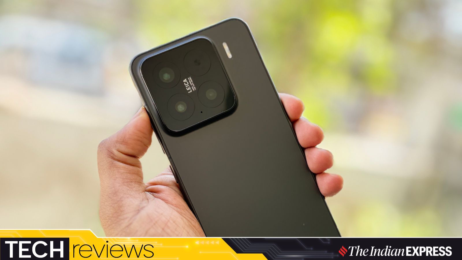 The new Xiaomi 15 sports curved edges and a glass back that feels premium. (Image: Bijin Jose/The Indian Express