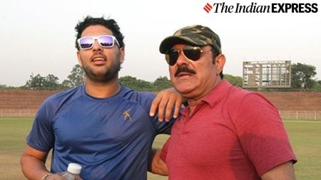 Indian cricketer Yuvraj Singh sharing some lighter moments with his father Yograj Singh off the field at Sector 16 Cricket Stadium in Chandigarh on Thursday, October 11 2012