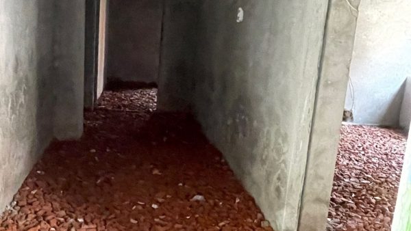 Cemented walls and gravel on the floor is all that classrooms have as of now- as the school continues to run in double shift due to shortage of rooms. (Express Photo)