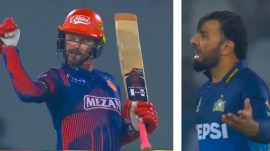 (LEFT) Colin Munro gestures towards Iftikhar Ahmed during a PSL game. (PHOTO: PSL via X)