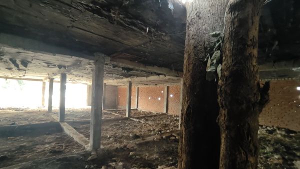 As a result, the town has entire complexes of empty homes, ranging from tiny one-room set structures to palatial six-room buildings with no wiring, plumbing, or flooring.