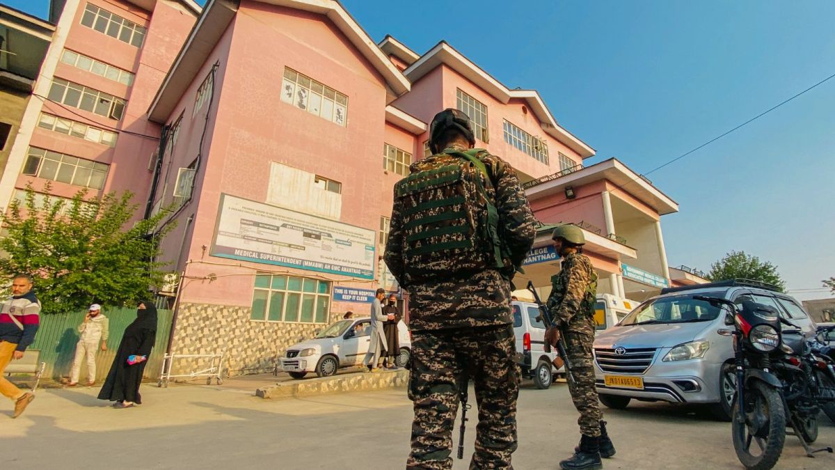 Security personnel stand guard after terrorists attacked a group of tourists at Pahalgam, in Anantnag district