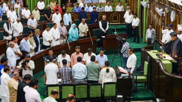 Jammu and Kashmir Chief Minister Omar Abdullah with MLAs observes silence to pay tributes to the victims of Pahalgam terror attack during the one-day special session of the J&K Assembly, in Jammu