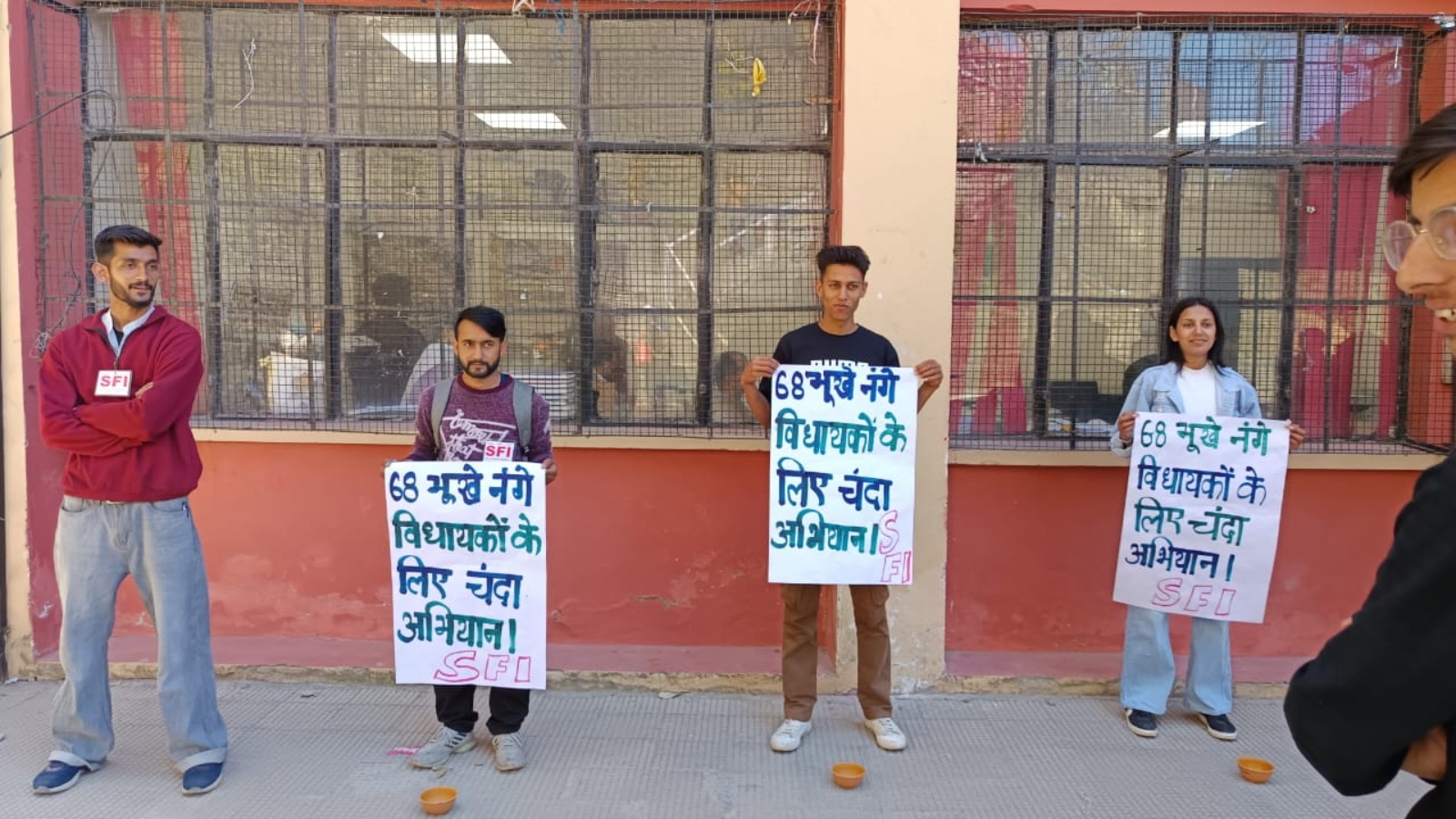 SFI activists during the protest at HPU campus, Tuesday. Express