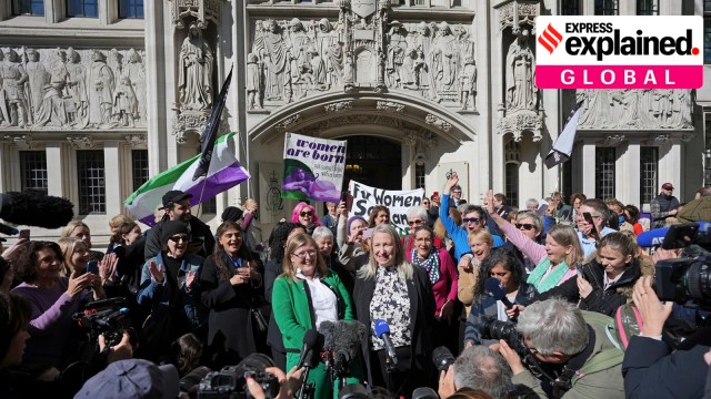 Marion Calder and Susan Smith from For Women Scotland, celebrate outside the Supreme Court to challenge gender recognition laws, in London, Wednesday, April 16, 2025.