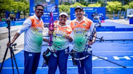Madhura Dhamangaonkar (C) and Abhishek Verma (R) won the mixed team compound bronze medal. The former also won individual gold. Credit: World Archery