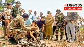 Army personnel inspect the debris of a projectile after Pak shelling at Damtal in Himachal’s Kangra on Saturday. (ANI)