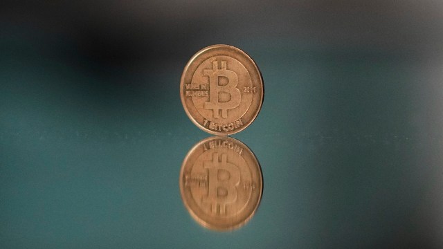 Bitcoin token on a mirror in Prague