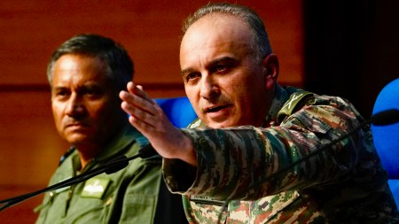Director General of Military Operations Lt. Gen. Rajiv Ghai, right, speaks at the DGMO media briefing as Air Marshal AK Bharti looks on in New Delhi on Sunday. (AP Photo)