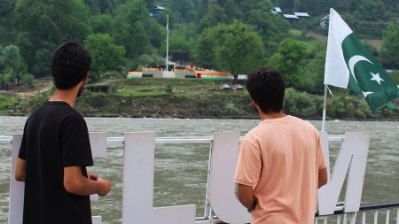 Local residents at a tourists point in Karen, in the Neelum Valley near on the Line of Control (AP photo)