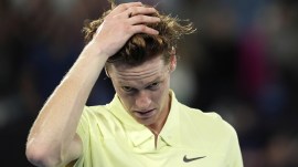 Jannik Sinner of Italy reacts after defeating Alexander Zverev of Germany in the men's singles final at the Australian Open tennis championship in Melbourne, Australia, Sunday, Jan. 26, 2025. (AP Photo)