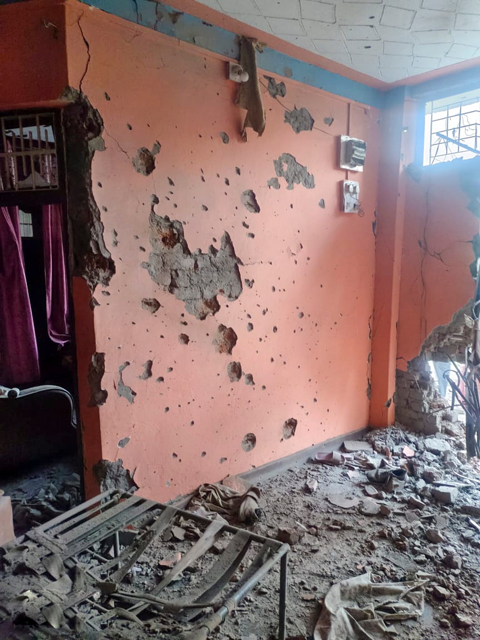 A damaged property after heavy shelling by Pakistan military overnight across the Line of Control and International Border, at Irwan Khanetar village in Rajouri.