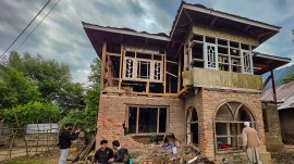 A damaged house after shelling by Pakistani troops, in Gingle area of Uri in Baramulla district on Friday